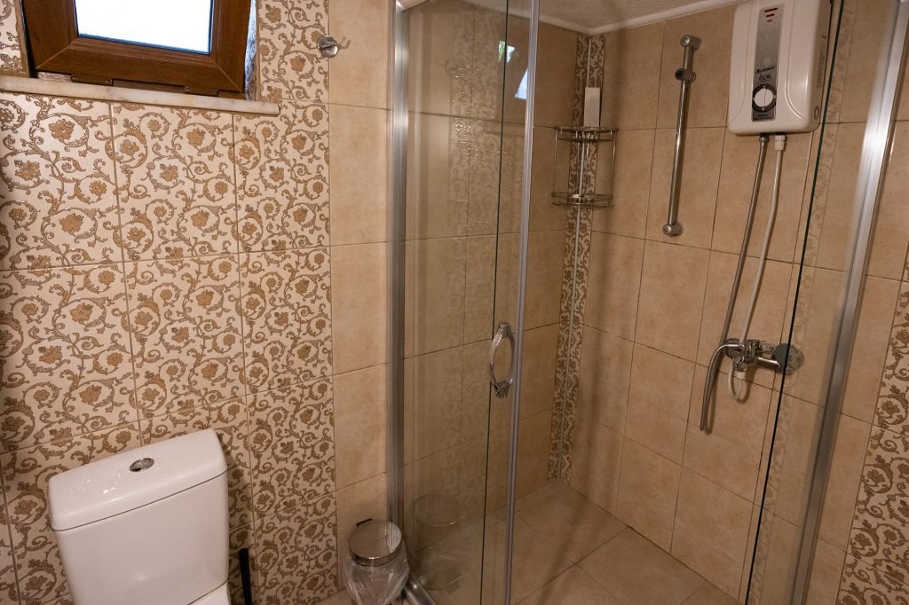 The bathroom, with shower cabin